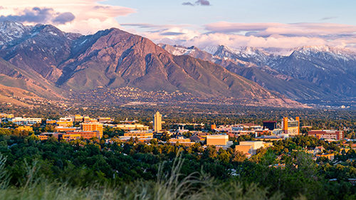 Sunset photo of the University of Utah campus at the base of the Wasatch Mountains
