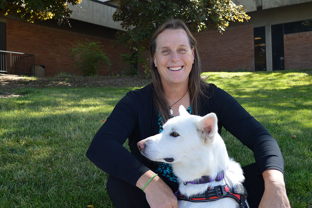 PhD student Candice Metzler with her dog