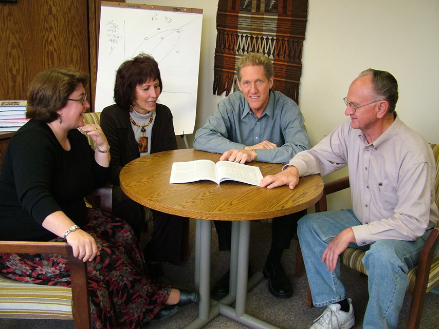 A group of four Social Research Institute faculty