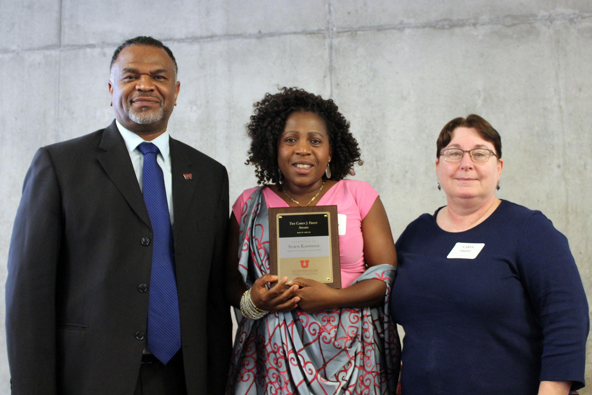 Dean Martel Teasley, Sauvis Kanyange, & Caren Frost at the College of Social Work awards dinner in 2018