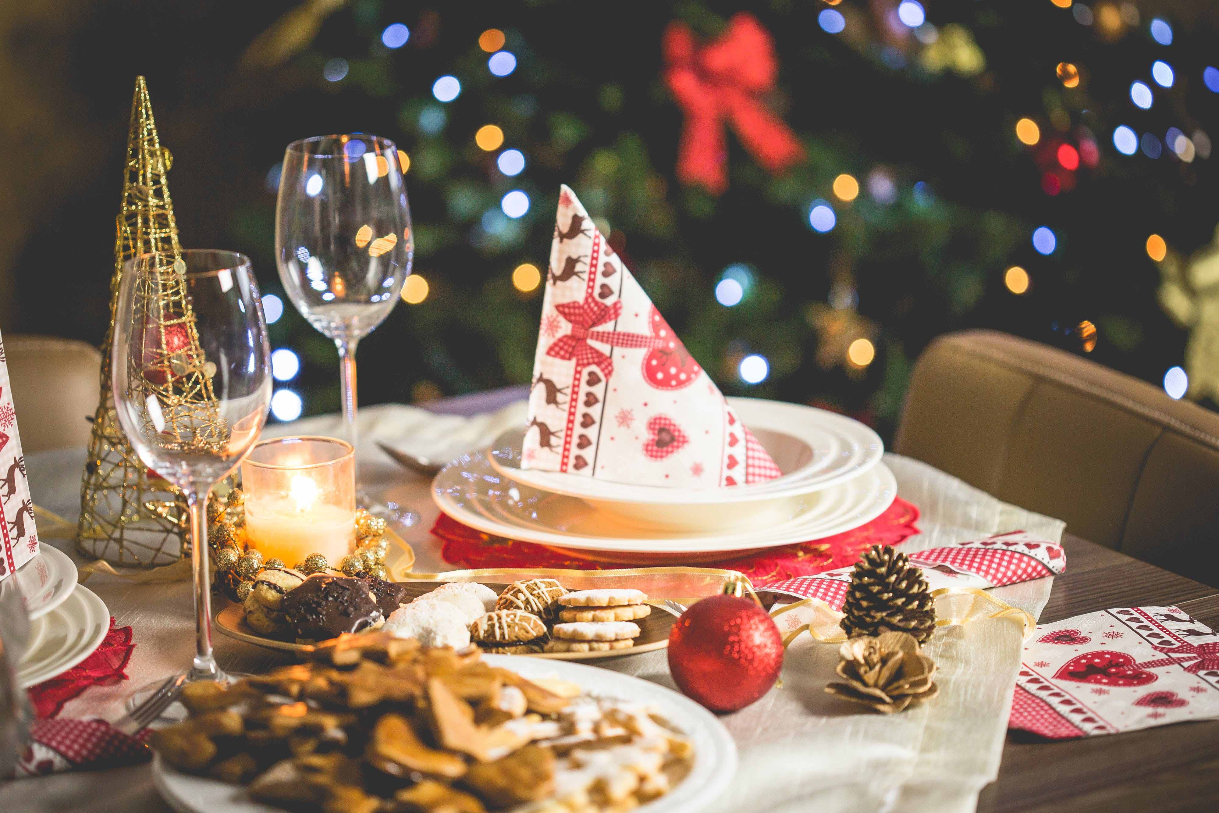 a table laden with holiday food and decor